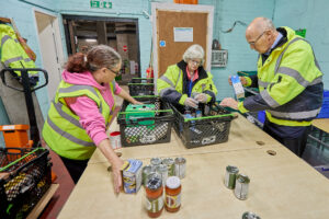 Volunteers at the Foodbank sorting items