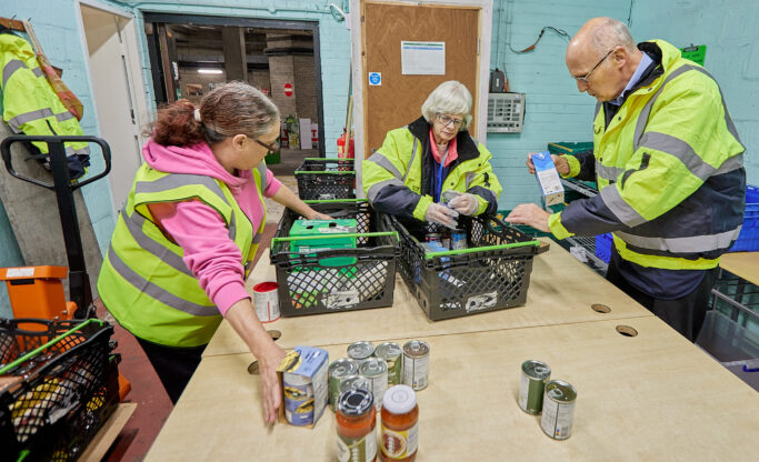 Volunteers at the Foodbank sorting items