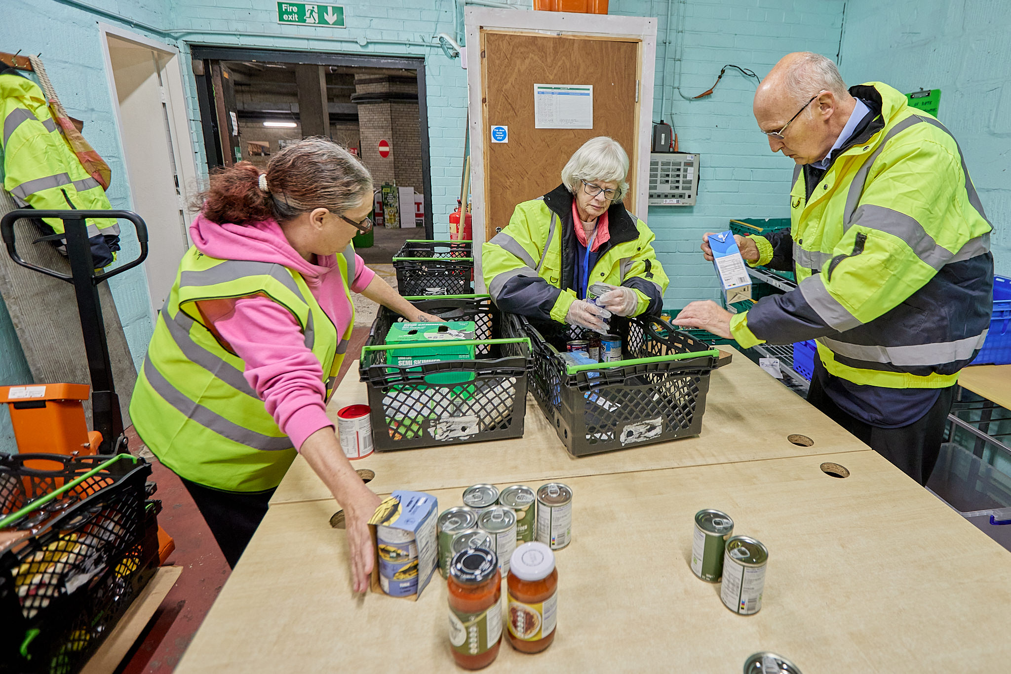 Volunteers at the Foodbank sorting items