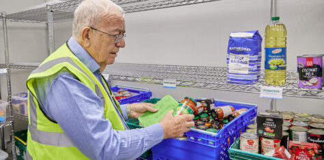 Foodbank volunteer in warehouse